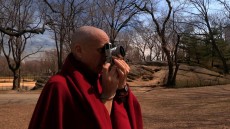 Monk with a Camera Image 1